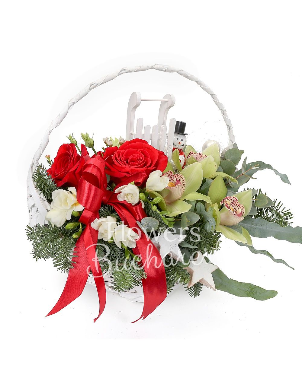 3 red roses, 3 cymbidium, 5 freesias, 1 white lisianthus, waxflower, greenery, silver fir, christmas decorations, basket